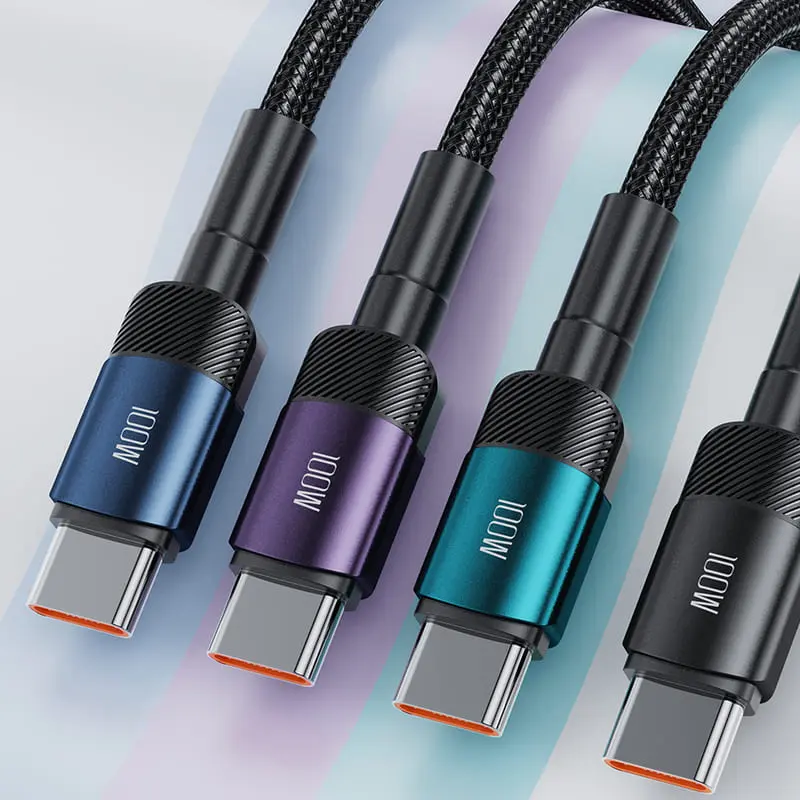 Image de plusieurs câbles USB de marque Toocki, présentant des connecteurs USB-C. Les câbles sont en nylon tressé et affichent différentes couleurs : bleu, violet et vert. Les connecteurs ont une finition distinctive, mettant en avant la marque "Toocki".